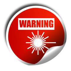 Laser warning sign, 3D rendering, red sticker with white text