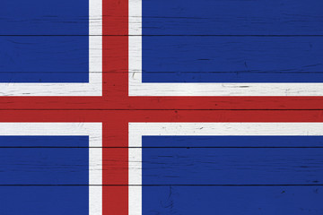 Fototapeta premium Flag of Iceland on wooden background