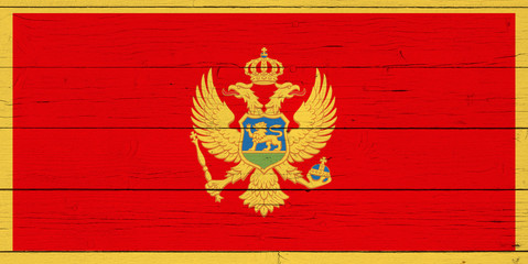 Flag of Montenegro on wooden background