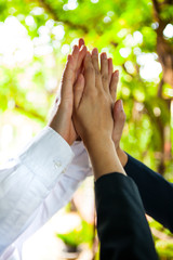 business team giving high five
