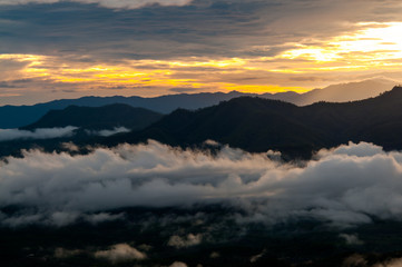 Soft focus of sunrise with fog on the mountain.background