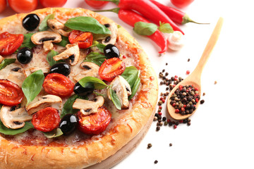 Delicious tasty pizza with vegetables on light background