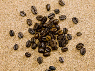 Fototapeta na wymiar Scattered Coffee Beans On Cork