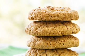 homemade cookies on the table, colored tea cups
