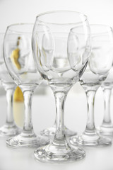Wineglasses on blurred interior background