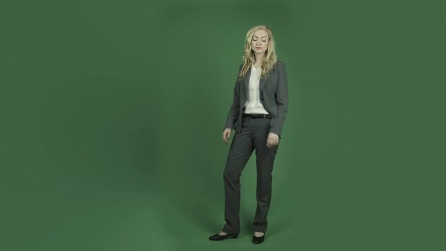 caucasian businesswoman isolated on chroma green screen background waiting