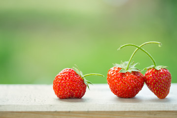 strawberries on a wooden table