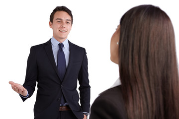 Young Caucasian business man smiling happily to a business woman