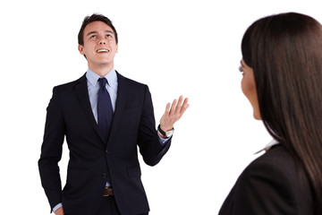 Young Caucasian business man smiling happily to a business woman