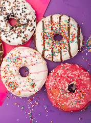 Donuts on color background.