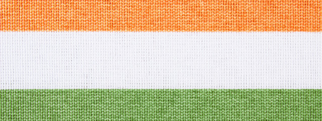 Colorful striped tablecloth as background