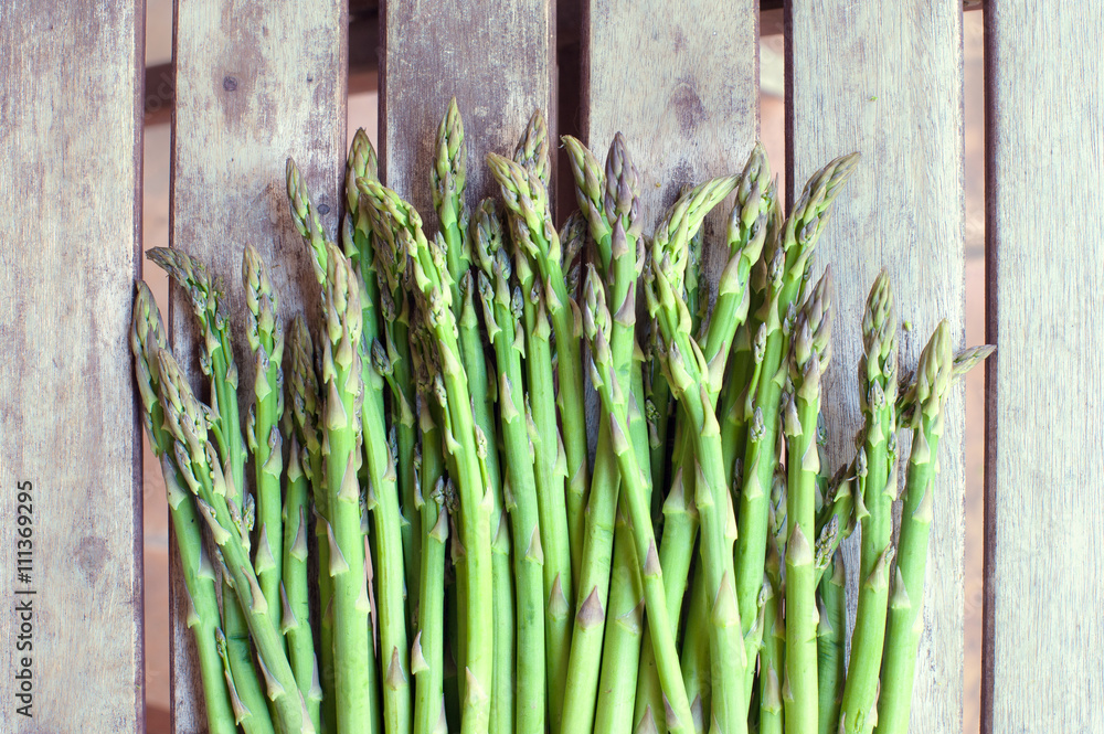 Wall mural Bunch of fresh green asparagus vegetable