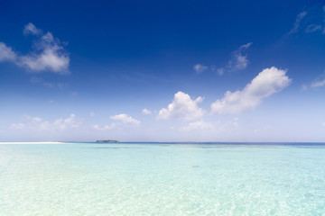 Beautiful island beach with sandspit at Maldives