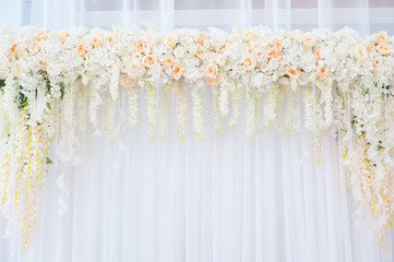 Beautiful Wedding arch of white and pink roses for the ceremony
