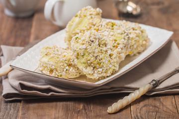 Meringue roulade with pistachio nut