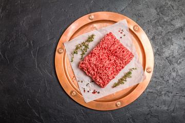 Minced meat with seasoning and fresh thyme