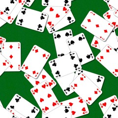 seamless pattern texture background with playing cards irregularly scattered on the green table