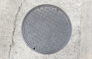 Rusty, grunge manhole cover