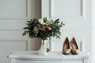 beautiful modern wedding bouquet on wooden planks