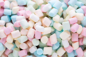 Background or texture of colorful mini marshmallows.