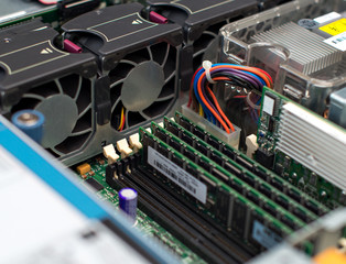 Inside of server pc. Motherboard, cooler fans and RAM memory.