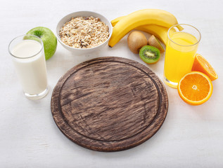 Blank cutting board with ingredients for cooking healthy food