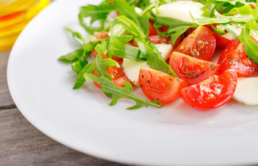 colorful fresh salad with mozzarella