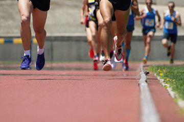 Athletics people running on the track field