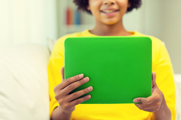 happy african american woman with tablet pc