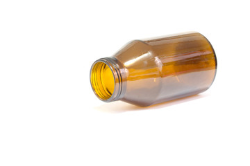 Pills spilling out of pill bottle