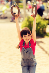 happy little girl on children playground