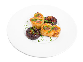 Wrapped dough sausages with onions.