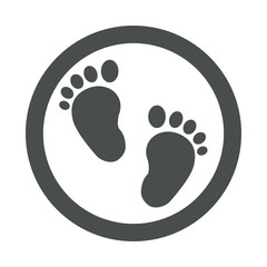 Icono plano pisadas de bebé en circulo color gris