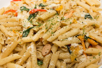 Closeup fried macaroni with sausage