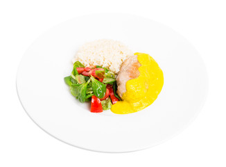 Roasted chicken fillet with saffron mousse.