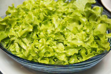  close-up of lettuce salad on glass