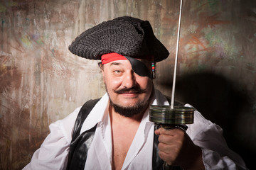 old pirate with a chest with DVD