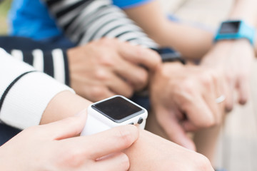 people wearing smartwatch