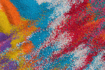 Fototapeta na wymiar Background of colored sand closeup