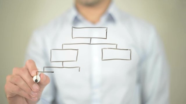 Hierarchy, Concept Illustration,  Man writing on transparent screen