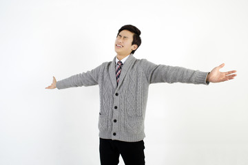 Successful business man spreading arms