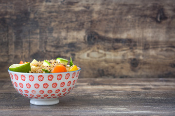 Quinoa salad on a rustic wooden table
