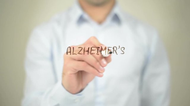 Alzheimer's Disease,  Man writing on transparent screen