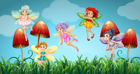 Fairies flying in the mushroom garden