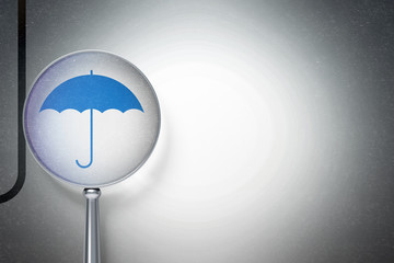 Fototapeta na wymiar Security concept: Umbrella with optical glass on digital background