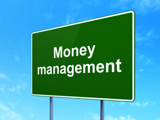 Currency concept: Money Management on road sign background