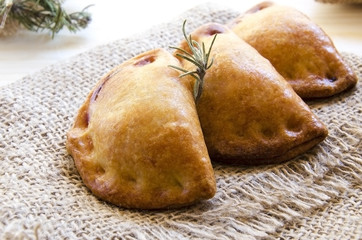 Closeup of typical spanish empanadillas, small meat or tuna fried pies.