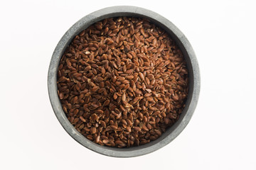 Linseeds on white background