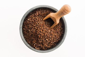 Linseeds on white background