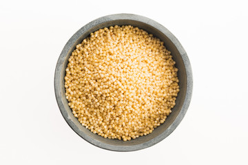 millet groats on white